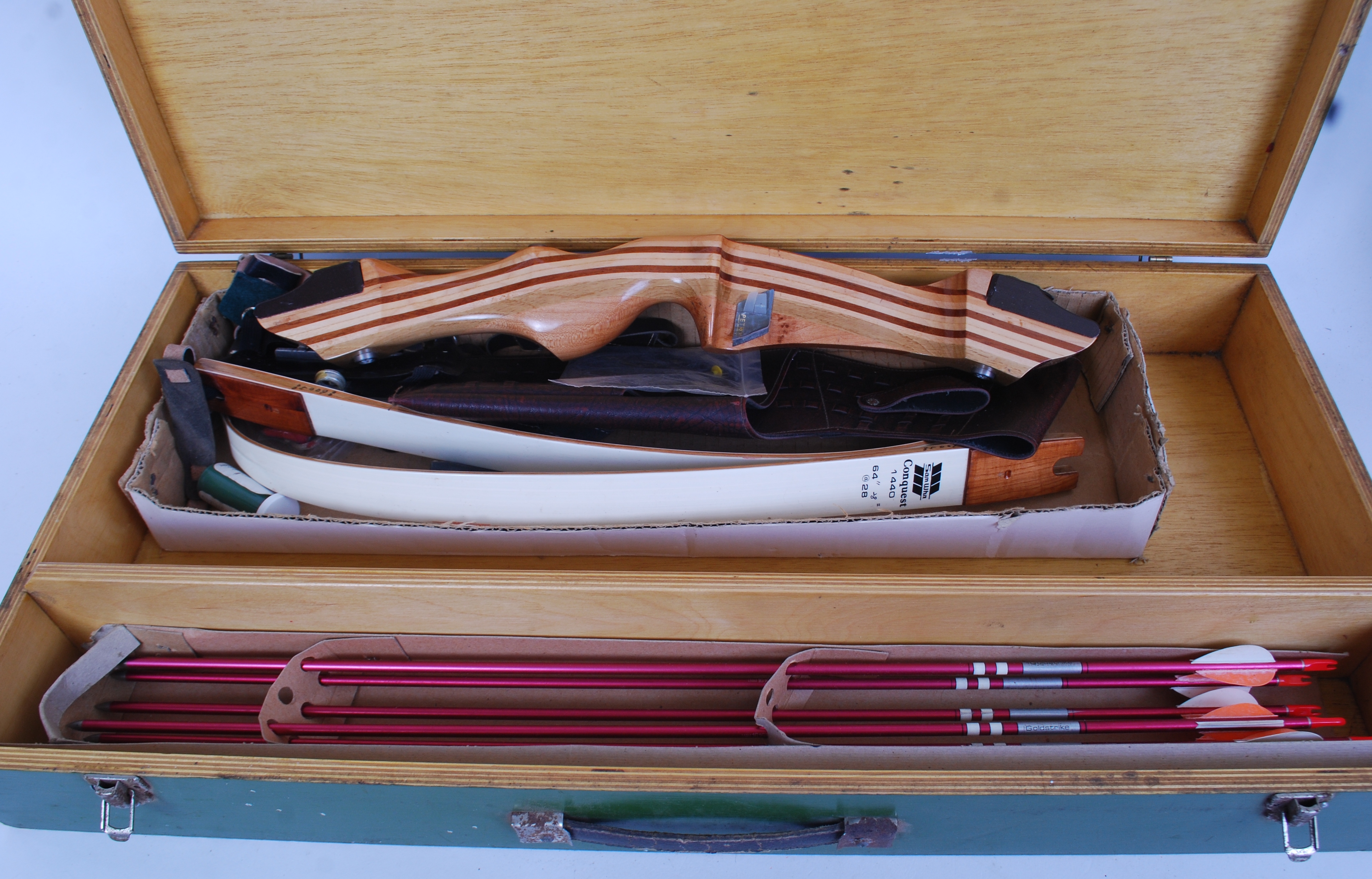 ARCHERY SET; A vintage original Sam Wha Conquest 144 archery bow and