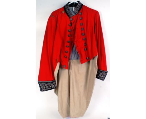 INFANTRY UNIFORM: An original vintage military issue Infantry regiment (unknown) red jacket. Detailed with silkwork to the co