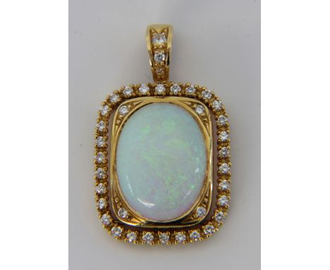 EDLER OPAL-BRILLANT-ANHÄNGER750/000 Gelbgold mit einen sehr schönen Vollopal mit blau-grün irisierendem Farbspiel, ca. 11,41c