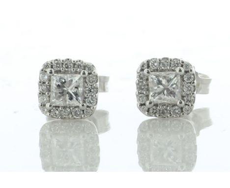 One natural princess cut diamond is surrounded by a halo of sixteen round brilliant cut diamonds on each of these classic stu
