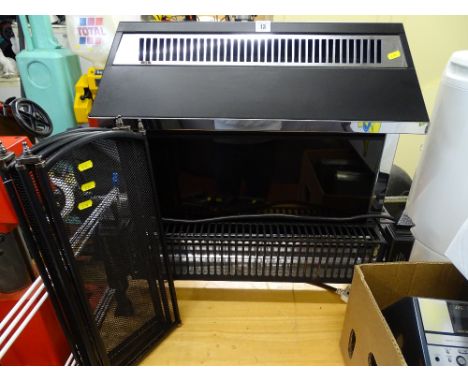 Electra Sovereign black and silver electric heater and a small black mesh fireguard E/T