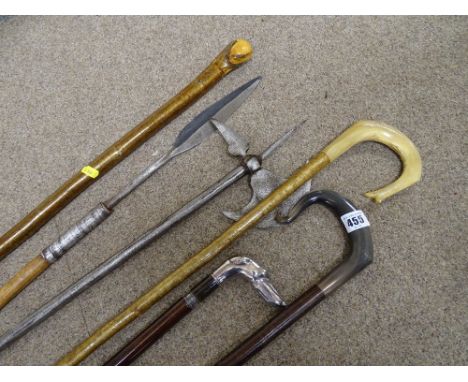 Vintage style axe and spear along with two walking canes and two shepherd's type crooks