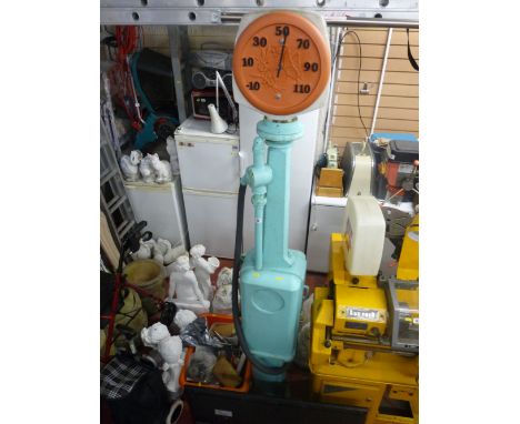 Ornamental vintage petrol pump with temperature gauge dial and interchangeable total pillar globe