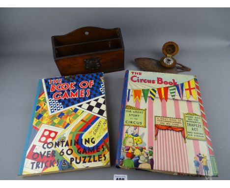 Two boxed children's books, small oak letter rack and a carved wood fruit and leaf inkwell