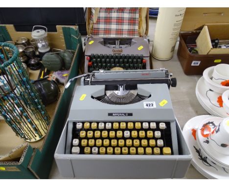 Two cased vintage typewriters by Imperial and Oliver