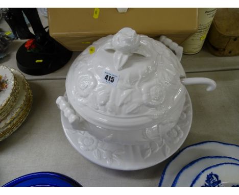 Large white pottery lidded tureen and ladle on stand containing a collection of book matches etc