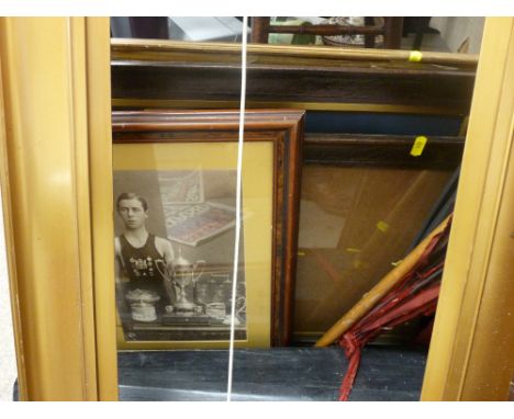 Parcel of pictures and framed prints depicting a Cardiff athlete standing with an array of trophies to the foreground, a vint