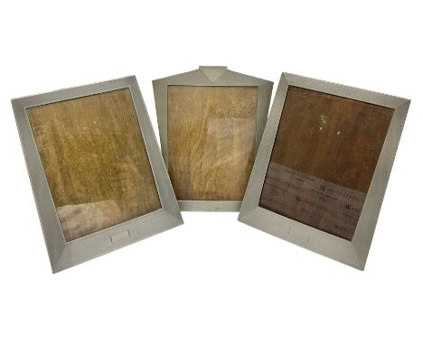 Three Art Deco pewter photograph frames, each with wooden easel supports, stamped Framecraft verso, tallest H25cm