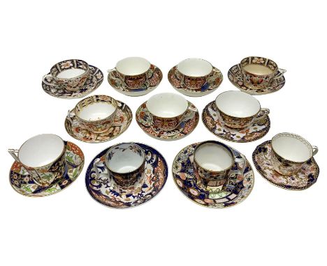 Early 19th century and later, eleven Royal Crown derby teacups and saucers in various patterns, to include Imari, Garden plat