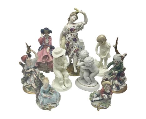 Pair of Capodimonte figures, a young girl picking grapes, and a boy warming hands on a fire, together two Royal Worcester fig