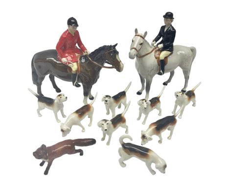 Beswick hunting group, comprising huntswoman on grey horse no 1730, huntsman on brown horse no 1501, fox figure no 1440 and e