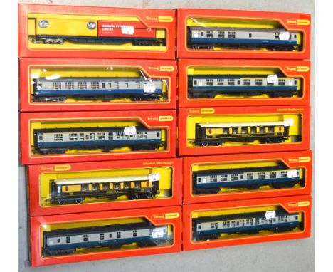 Tri-ang Hornby H0/00 gauge coaches and rolling stock comprising four R.727 composite coaches in blue, an R.339 B.R. second cl