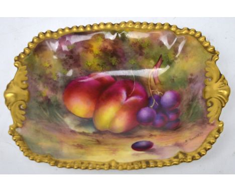 Royal Worcester; a porcelain shaped dish painted with fruits by Edward Townsend, 17.5 x 12.5cm, date code for 1928.   CONDITI