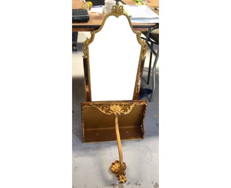 A reproduction ornate gilt bevel edge mirror and matching wall shelf/bracket, height of mirror 92cm.
