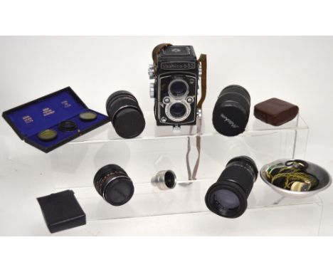 A small quantity of photographic equipment to include a Cosina Macro MD93510218 lens, a Carl Zeiss Jena lens, a Carl Zeiss Je