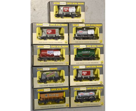 Tri-ang Wrenn H0/00 gauge rolling stock comprising a W5056 hopper wagon, a W5006 ore wagon, a W5076 petrol wagon, two W5042 p