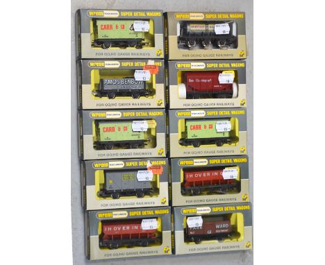 Tri-ang Wrenn H0/00 gauge rolling stock comprising three W5027 refrigerator vans, two W5036 hopper wagons, a W5067 plank wago