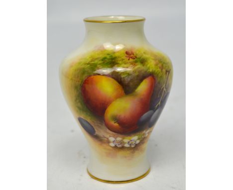 Royal Worcester; a vase painted with pears and grapes by Edward Townsend, no.2491, height 10cm, date code 1933.   CONDITION R