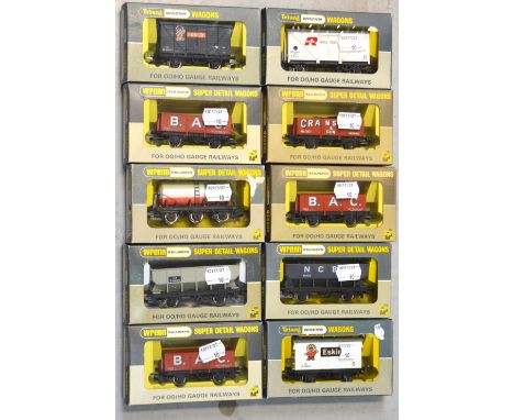 Tri-ang Wrenn H0/00 gauge rolling stock comprising a W5035 hopper wagon, a W4320P refrigerator van, a W4644 hopper wagon, thr