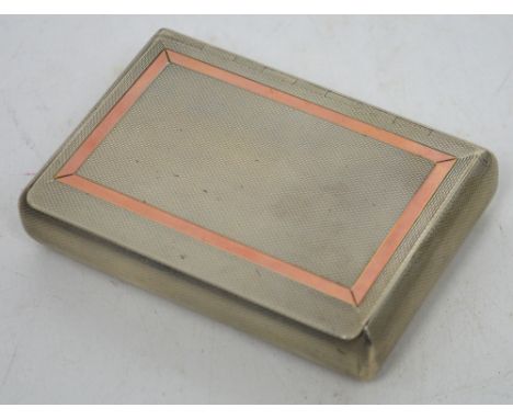A hallmarked silver engine-turned triple-section snuff box with rose metal inlay to top and border, London assay mark, approx