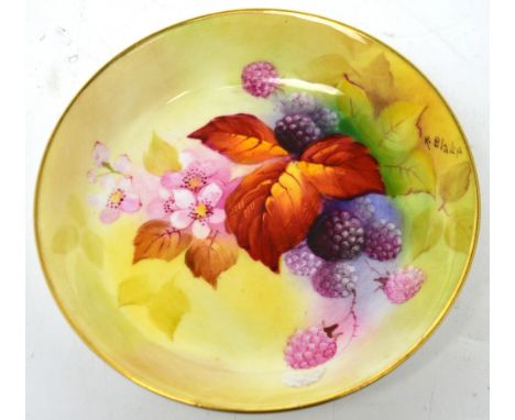 Royal Worcester; a small dish painted with Autumn leaves and berries by Kitty Blake, date code 12935, diameter 11.5cm.   COND