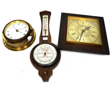 A brass-effect 'Eurastyle' ship's clock, a modern mahogany wall barometer (af) and a Kienzle mahogany-cased square wall clock