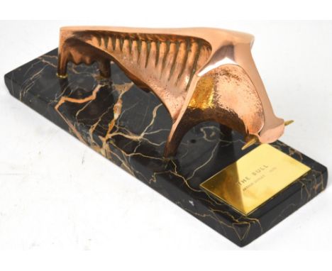 ARTHUR DOOLEY (1929-1994); a patinated bronze stylised model 'The Bull', raised on rectangular marble base with plaque dated 