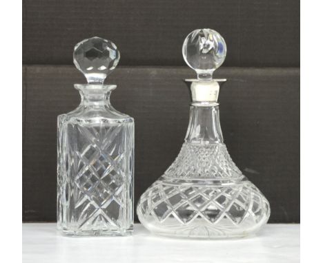 A ship's decanter with Elizabeth II hallmarked silver collar, London 1978 and a further decanter (2).