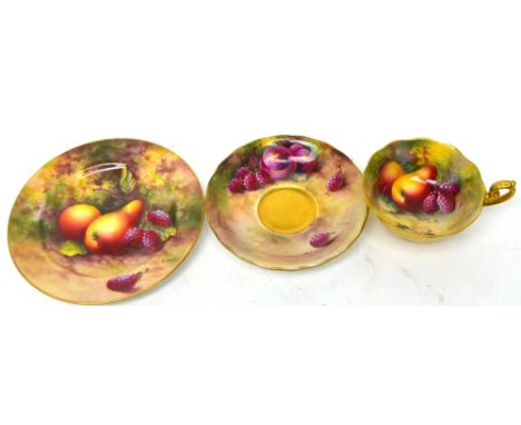 Royal Worcester; a porcelain trio painted with fruits, comprising cup and plate painted by Edward Townsend and saucer by Ayrt