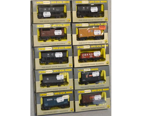 Tri-ang Wrenn H0/00 gauge rolling stock comprising a W5046 ventilated van, a W5010 ventilated van, a W5048 coal wagon and loa