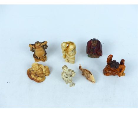 A collection of Japanese carved ivory netsuke, together with similar carved items.