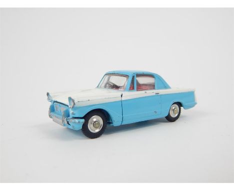 A Corgi Triumph Herald Coupe (231) with opening bonnet and original box.