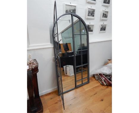 A distressed metal architectural style arched wall mirror, with 'windows' that can open wide, 169 x 90cm.