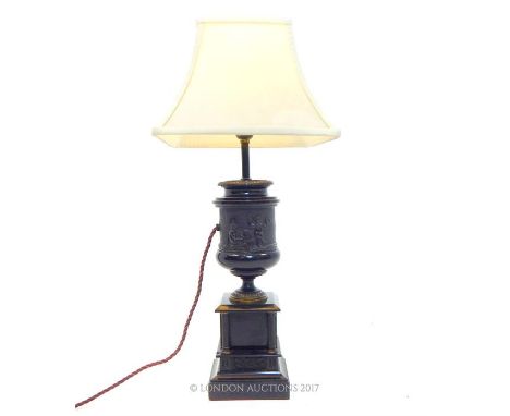 A 19th century black marble urn table lamp;  overall height including shade 58 cm.