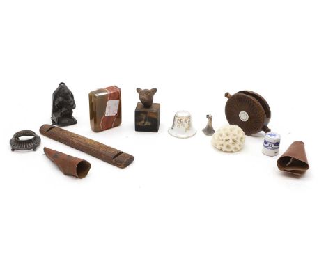 A quantity of various ornaments including, coral, 5cm diameter, a stone animal head, mounted on a wooden plinth, 7cm overall,