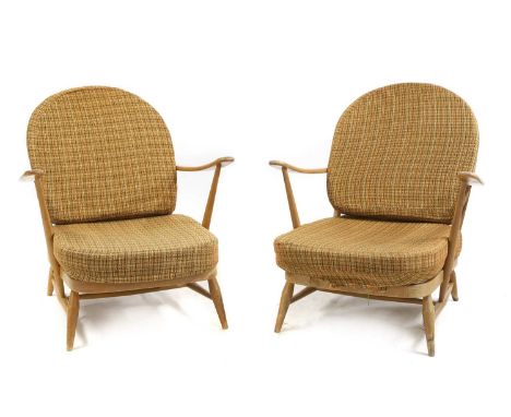 A pair of beech Ercol 'Windsor' chairs designed by Lucian Ercolani, model 203, with squab cushions backs and seats, 72cm wide