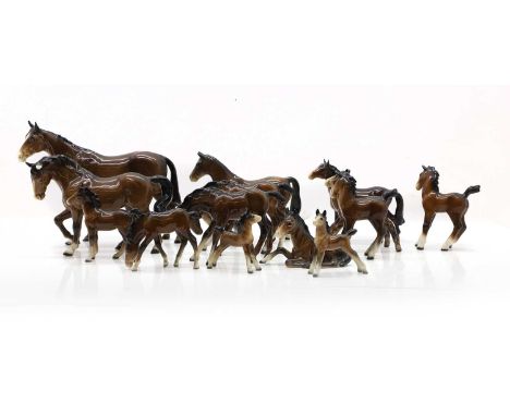 A collection of Beswick model horses predominantly chestnut examples in various poses,9cm height of tallest (qty.)Condition R