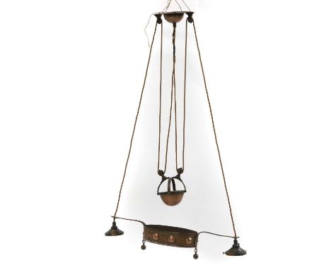 A French copper rise and fall ceiling light, 20th century, fitted with a ceiling boss, an oval and single branch light fittin