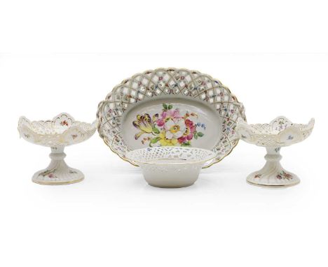 A Dresden porcelain oval basket, early 20th century, the foliate decorated centre within a pierced lattice border, 38cm wide,