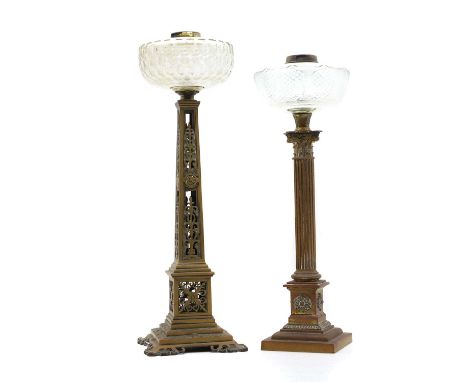 A brass framed oil lamp with glass reservoir, late 19th century, and another similar tallest 59cm high(2)Condition ReportNeit
