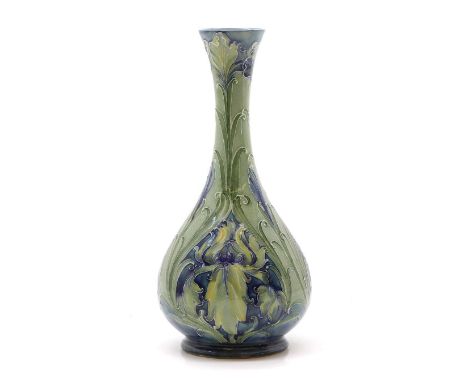 A Moorcroft MacIntyre vase, designed by William Moorcroft for Liberty and Co., printed marks and a green signature in green,2