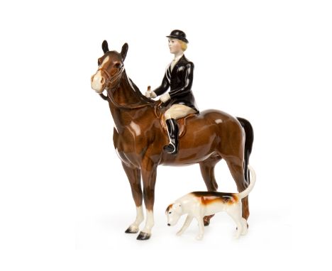 BESWICK FIGURE GROUP OF A HUNTSWOMAN ON HORSEBACK model number 1730, printed marks to horse's belly, 21.5cm high; along with 