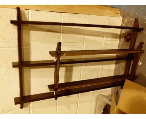 Two wooden cabinet plate display racks, probably Ercol