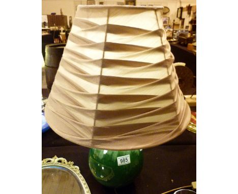 Poole pottery hand glazed green lamp base with a silk lamp shade H: 56 cm