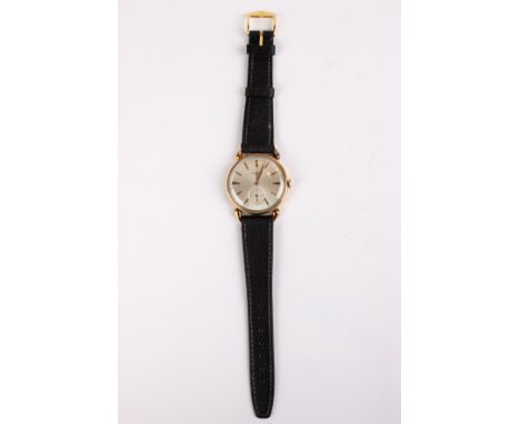 Longines. Reloj de pulsera de caballero hacia 1960. Caja en oro amarillo de 18 k., esfera plateada con numeración de barras y