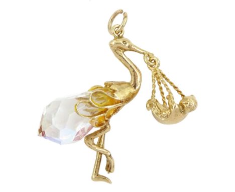 9ct gold crystal stork carrying a baby pendant / charm, hallmarkedCondition Report:Approx 7.7gm, some glue showing, top loop 