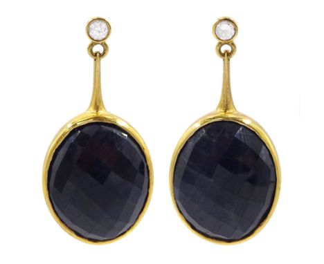 Pair of 18ct gold oval cut sapphire and round brilliant cut diamond pendant stud earrings, hallmarked, total sapphire weight 