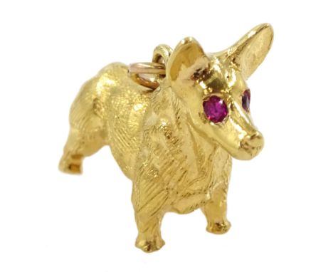 9ct gold corgi dog pendant / charm, with pink stone set eyes, hallmarkedCondition Report:Approx 7.45gm, length = 25mm, good c