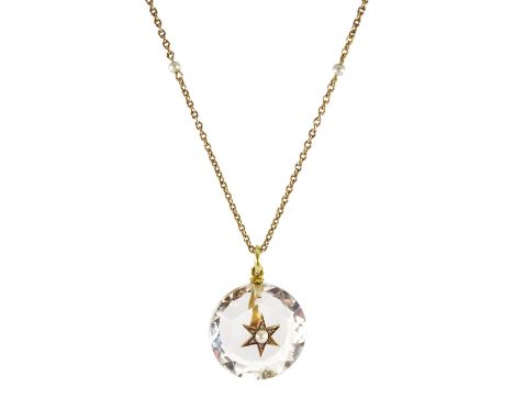 Victorian rock crystal pendant set with a central gold split pearl and diamond star, on gold chain necklace with three pearl 