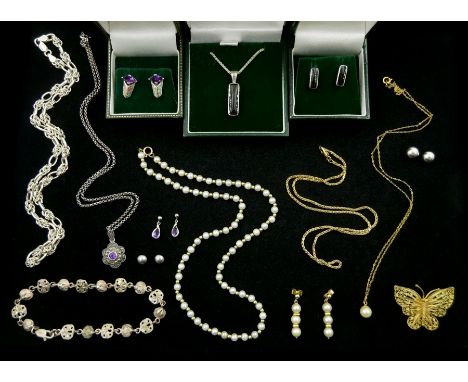 Gold jewellery including butterfly brooch, chain necklace, pearl necklaces, pair of pearl earrings and a pair of white gold e